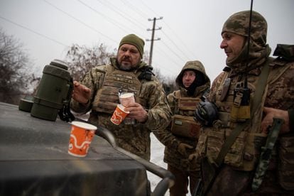 Ukrainian soldiers on the front lines near Bakhmut take a quick coffee break; January 14, 2023.