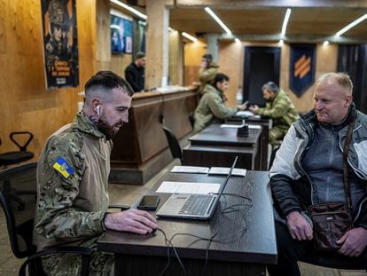 A volunteer aspiring to join the Armed Forces of Ukraine in a recruiting office in Kyiv.