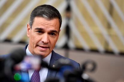Spain's Prime Minister Pedro Sanchez speaks with the media as he arrives for an EU summit in Brussels, on October 20, 2022.
