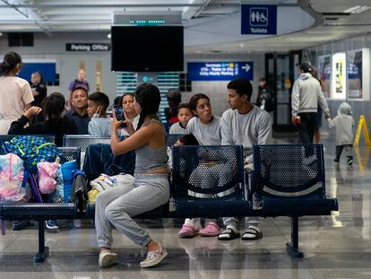 Run by a private firm hired by the city, migrants stay in a makeshift shelter at O'Hare International Airport, Wednesday, Sept. 20, 2023, in Chicago