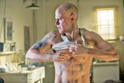 A shaven-headed Matt Damon stars in Elysium.