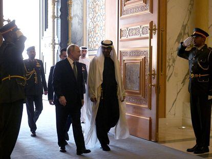 President of the UAE Sheikh Mohamed bin Zayed Al Nahyan and Russian President Vladimir Putin walk during a meeting at Qasr Al Watan in Abu Dhabi, UAE December 6, 2023.
