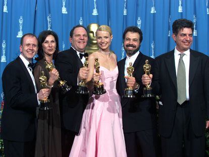 From left, David Parfit, Donna Gigliotti, Harvey Weinstein, Gwyneth Paltrow, Edward Zwick and Marc Norman pose with their Oscars for 'Shakespeare in Love' on March 21, 1999, in Hollywood, California.