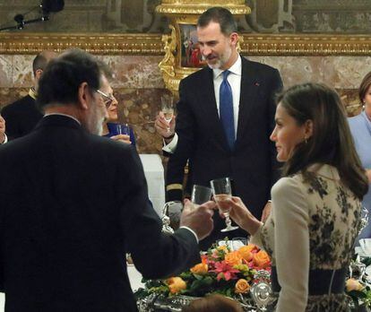 King Felipe VI of Spain with Queen Letizia and Prime Minister Mariano Rajoy in the foreground.