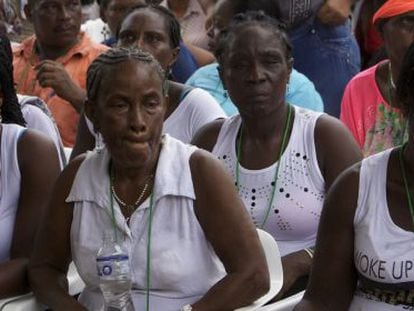 FARC victims attend a ceremony in Bojayá, Chocó, Colombia, where the guerrilla rebels publicly asked for forgiveness on December 5.