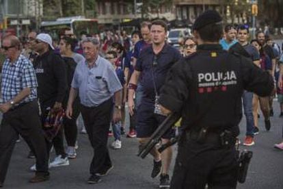 Armed police monitor the area around Barcelona's Camp Nou stadium.