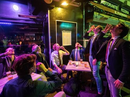 A group of young men celebrate the reopening of nightlife venues in the Netherlands two weeks ago.