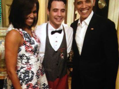 The Obamas with waiter Reinier Mely in Havana.