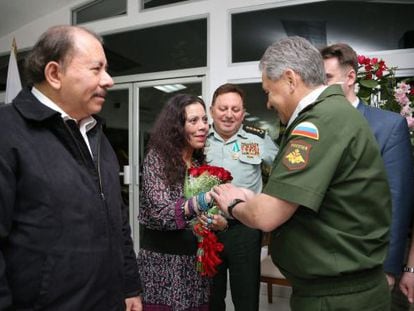 President Daniel Ortega, left, and his wife Rosario Murillo greet Russian Defense Minister Sergei Shoigu.
