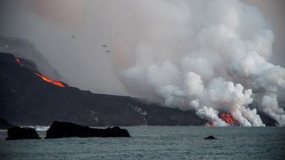 Lava flow from the volcano falling into the sea on the coast of Tazacorte, on La Palma, on Wednesday.