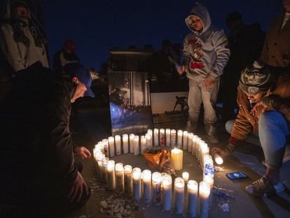 Soquoia Green, a cousin of Tyre Nichols, lights candles with family and friends during a vigil for him late Monday, Jan. 30, 2023, at Regency Community Skate Park in Natomas, where Tyree used to skateboard when he lived in Sacramento, Calif.