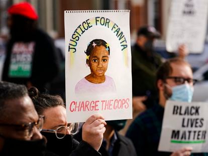 Protesters call for police accountability outside the Delaware County Courthouse in Media, Pennsylvania, on January 13, 2022, in response to the death of 8-year-old Fanta Bility.