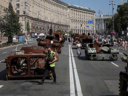 People visit an avenue where destroyed Russian military vehicles have been displayed ahead of the Independence Day in Kyiv, Ukraine.