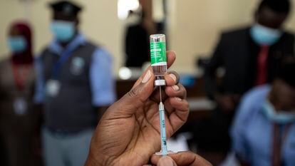 A nurse prepares a Covid-19 vaccine in Nairobi.