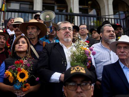 President-elect and vice-president-elect Bernardo Arevalo and Karin Herrera participate in a march in support of democracy on December 7, 2023, in Guatemala City.