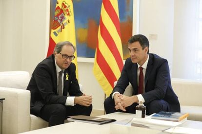 Quim Torra (l) and Pedro Sánchez in Madrid on Monday.