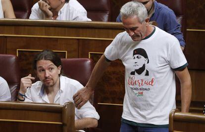 Podemos deputy Diego Cañamero with a protest shirt.