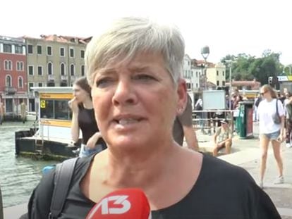 Monica Poli is interviewed by the media in Venice.