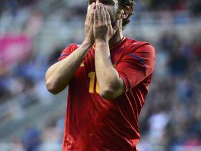 Juan Mata laments a missed chance.