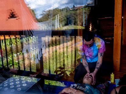 Therapists and clients gather at a healing center in Colombia to ingesting psilocybin mushrooms, listen to music, and participate in group therapy. Santa Elena, Antioquia, Colombia, June 25, 2022.