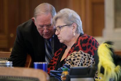 Kansas House Speaker Dan Hawkins confers with state Representative Brenda Landwehr ahead of a House debate on March 21, 2023, at the Statehouse in Topeka, Kansas.