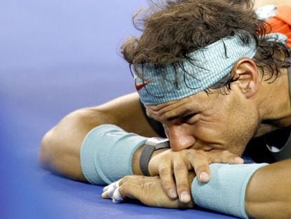 Rafael Nadal receives medical treatment during his men&#039;s final match against Stanislas Wawrinka at the Australian Open. 