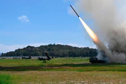 In this photo released by China's Xinhua News Agency, a projectile is launched from an unspecified location in China during long-range live-fire drills.