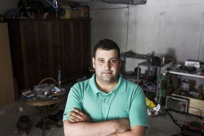 David Pena in the garage of his home outside Santiago de Compostela.