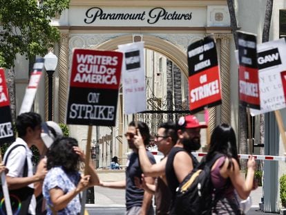 Striking WGA (Writers Guild of America) workers picket outside Paramount Studios on July 12, 2023, in Los Angeles, California.
