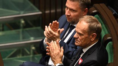 Donald Tusk and Marcin Kierwiński — the leader and general secretary of the Civic Platform respectively — attend the inaugural session of the Parliament of Poland on November 13, 2023.