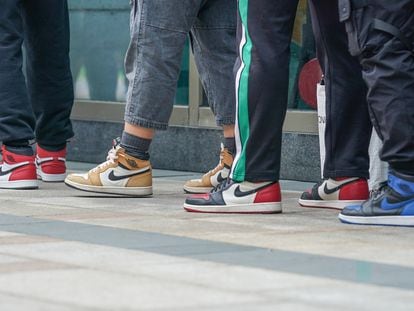 A line of customers waiting for the launch of a new model of the brand's star sneakers at a Nike store in Shanghai in October 2019.