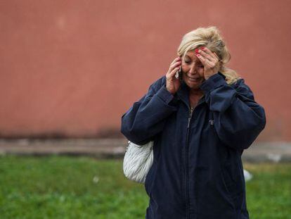 A relative of passengers involved in the Galicia train crash waits for news on Wednesday morning.