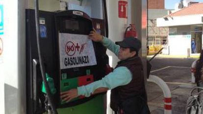 A man in Mexico City protests against the hike in gas prices.