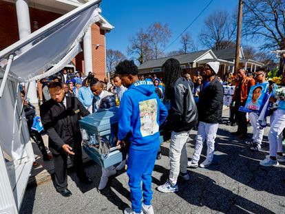 High school pallbearers carry the coffin of young shooting victim Lloyd LeVon Foster III, 16, during his funeral at the Greater Springfield Baptist Church in the Vine City neighborhood of Atlanta, Georgia, USA, 18 February 2023. The anti-gun violence 'Peace In The Streets Prayer Walk' joined the mourners during the service.