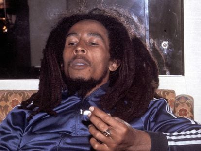 A 1976 photograph of Bob Marley smoking at the Plaza Hotel in New York.