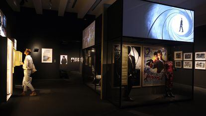 One of the exhibition rooms, with drawings, posters and costumes from the 'James Bond' films.