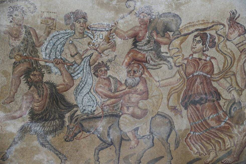 Detail of the mosaic in the living room of the Roman villa showing centaurs, musicians, satyrs and Silenus, represented as the old man on the donkey.