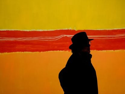 A visitor viewing 'No. 5' by Mark Rothko at the artist's retrospective at the Louis Vuitton Foundation in Paris.