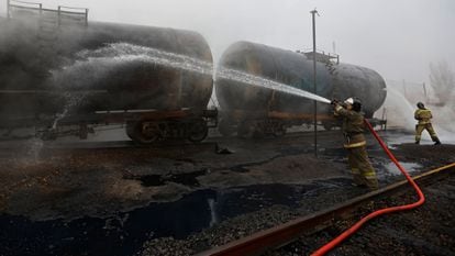Firefighters work to extinguish a blaze at a fuel storage site after Russian shelling in Makiivka, November 21, 2022. 