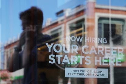 A Chipotle restaurant advertises it is hiring in Cambridge, Massachusetts, on August 28, 2023.