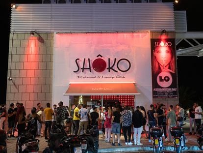 Young people wait in line to enter the nightclub Shoko in Barcelona.