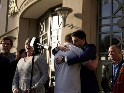 The parents of two of the victims killed in the Sandy Hook massacre hugging after the ruling against Alex Jones in Waterbury, Connecticut.