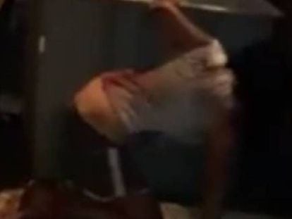 A screen grab of the video showing the woman being beaten to death.