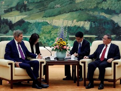 U.S. Special Presidential Envoy for Climate John Kerry and Chinese Premier Li Qiang attend a meeting at the Great Hall of the People in Beijing, China