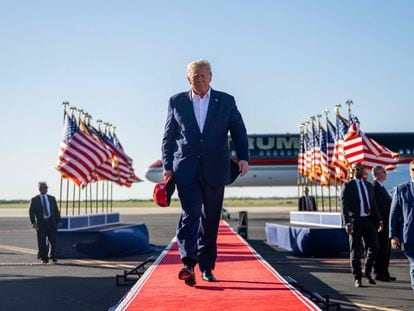 Former president Donald Trump arrives during a rally at the Waco Regional Airport on March 25, 2023, in Waco, Texas.