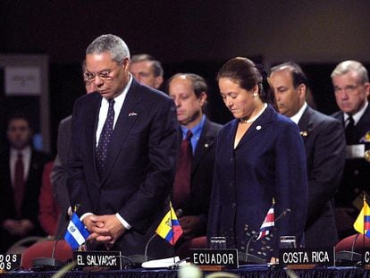 Colin Powell observes a moment of silence during a meeting of the Organization of American States after news of the 9/11 terrorist attacks broke.