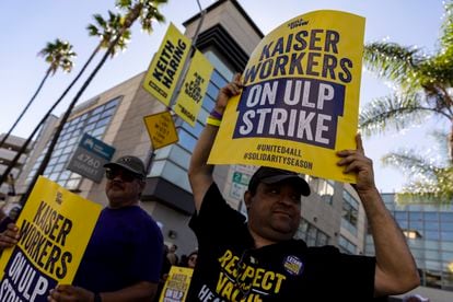 Healthcare workers picket outside Kaiser Permanente Los Angeles Medical Center in Los Angeles, California, October 5, 2023.