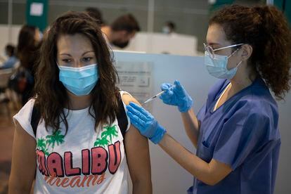 A young woman getting vaccinated against Covid-19 in Seville on July 14.