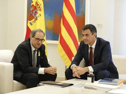 Quim Torra (l) and Pedro Sánchez in Madrid on Monday.