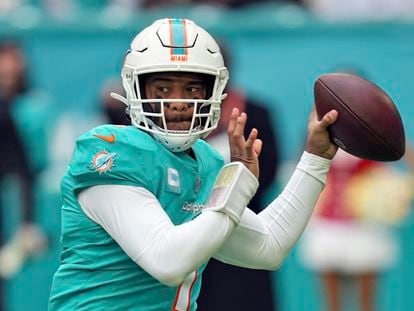 Miami Dolphins quarterback Tua Tagovailoa looks to pass during the first half of an NFL football game against the Green Bay Packers, December 25, 2022, in Miami Gardens, Florida.